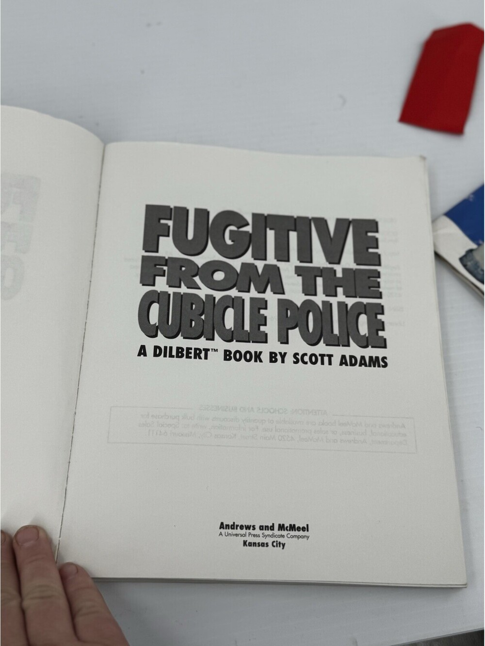 Fugitive From The Cubicle Police: A Dilbert Book by Scott Adams